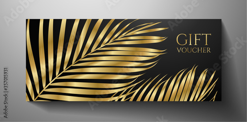 Gift Voucher/ Gift certificate with gold luxe palm branch isolated on black background. Premium template useful for vip invitation, golden coupon design