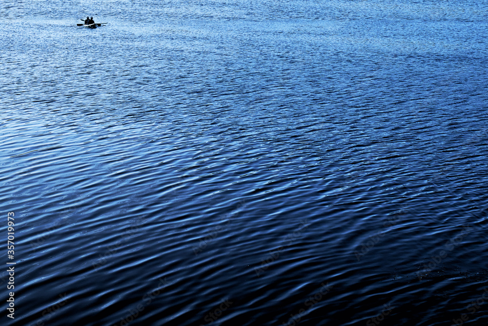 Fototapeta premium blue water background with boat