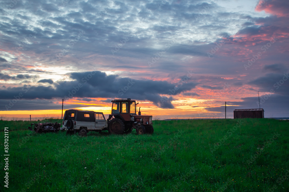 Fototapeta premium lonely old transport on sunset background