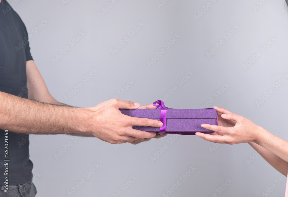 woman and man hand gift box
