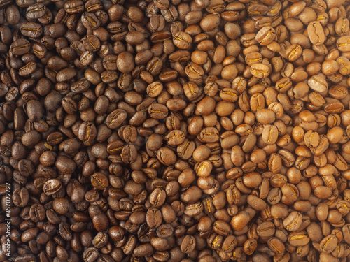 Top view, roasted coffee beans, brown, suitable for background images.