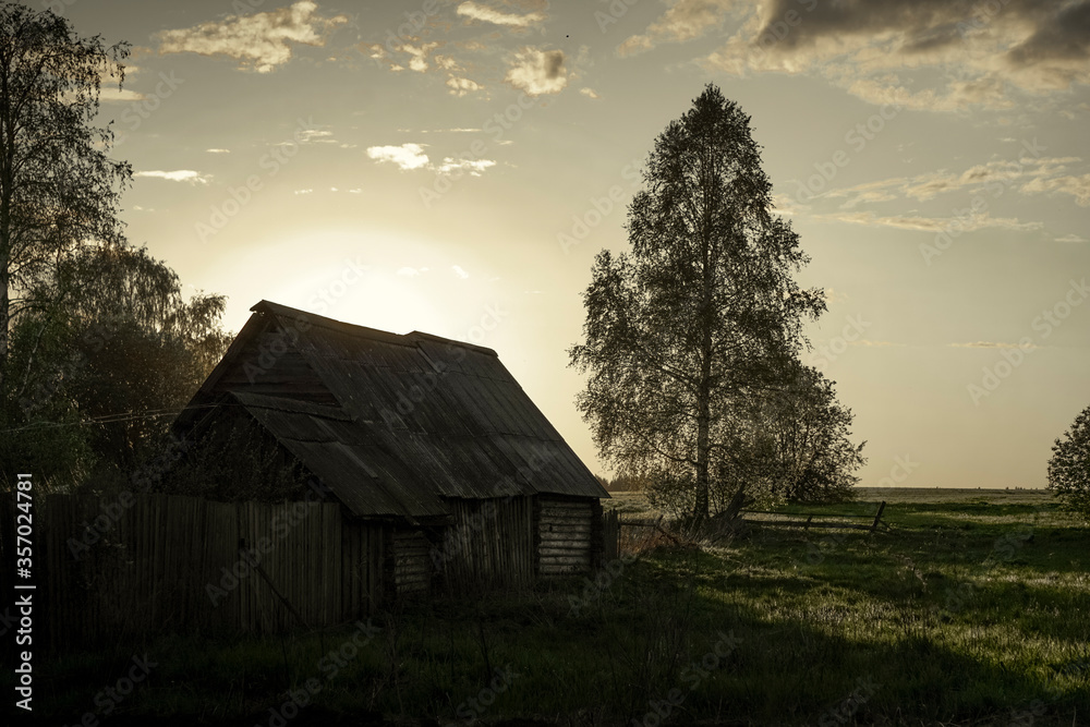 old barn in sunset old barn in sunset