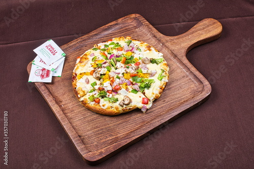 Photography Paneer pizza with vegetables and cheese