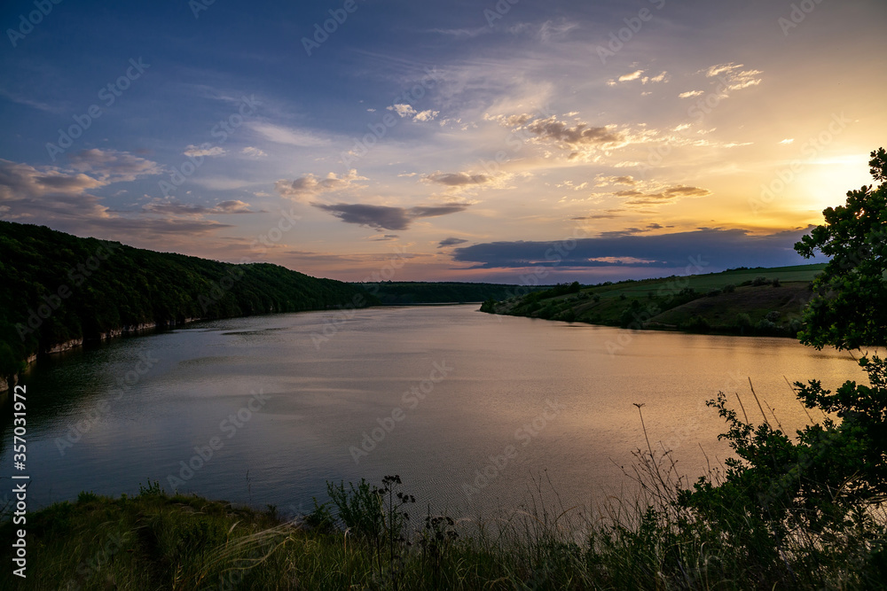 Dnister River Canyon. warm summer evening over the river.