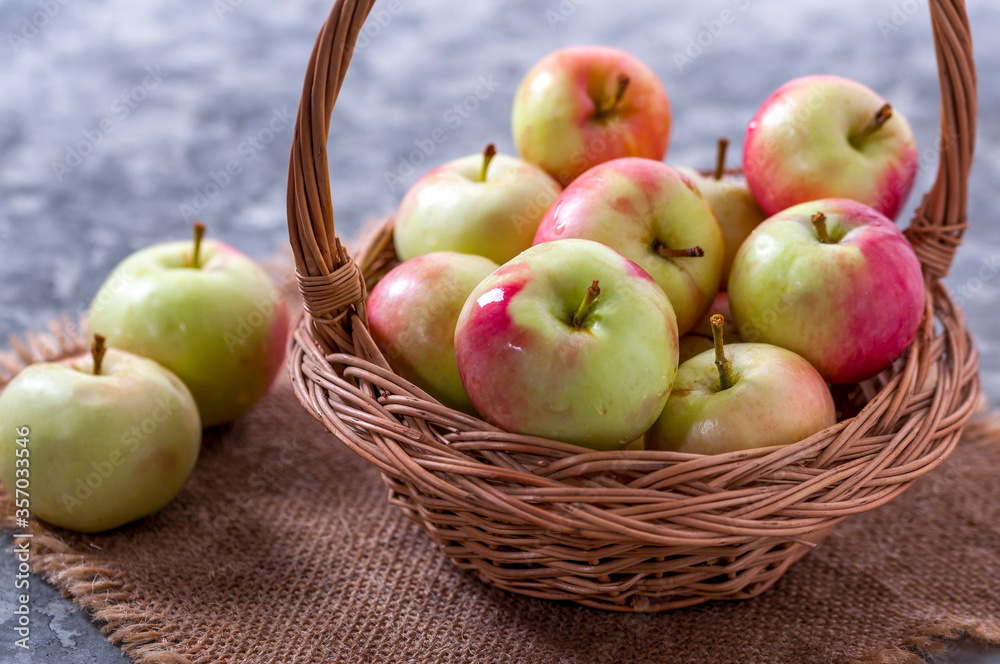 Tasty and healthy berry. Fruit season. Harvest ripe apples stacked in a basket. Tasty and healthy berry. Fruit season. Harvest ripe apples stacked in a basket.
