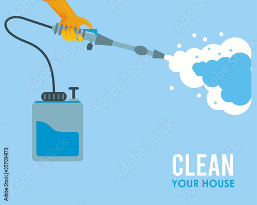 hand with rubber glove with disinfectan sprayer housekeeping