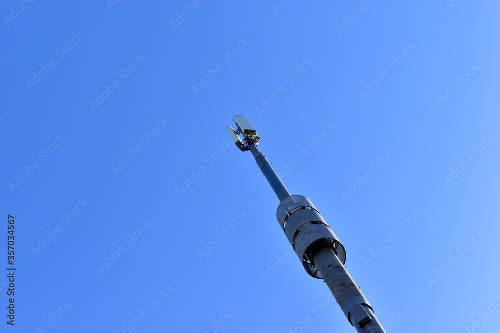 Fototapeta premium Powerful urban transmitting communication and signal antenna