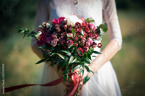 wedding bridal bouquet, flowers in hands