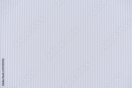 Background of corrugated colored paper. White paper texture background.