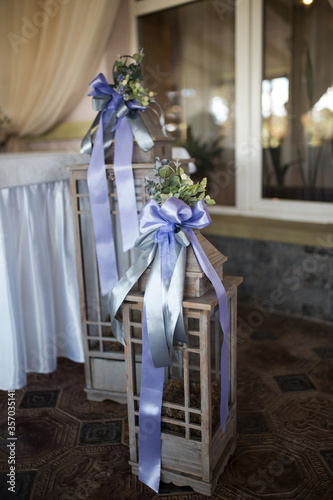 wedding photophone with lanterns with purple ribbons, wedding decoration