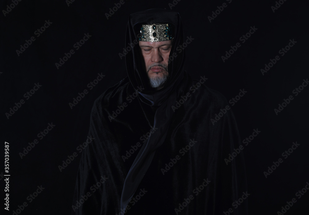 portrait of a medieval king on a black background