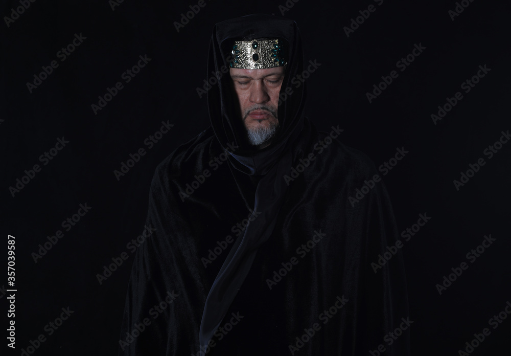 portrait of a medieval king on a black background portrait of a medieval king on a black background
