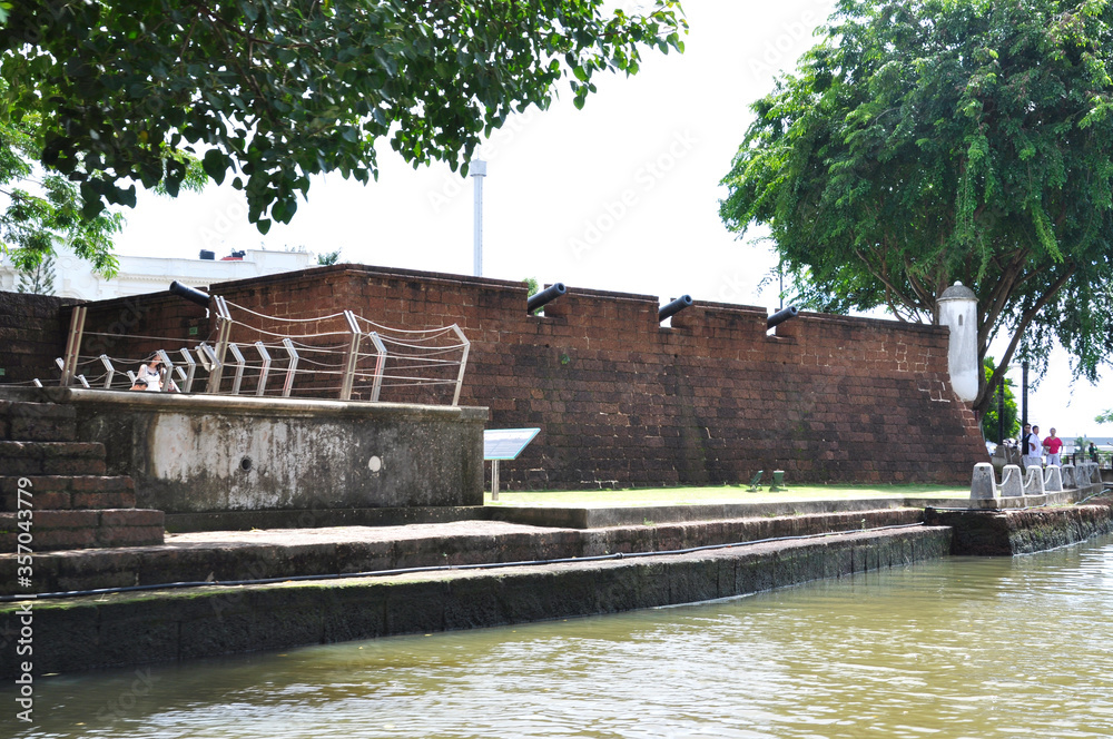 MELAKA, MALAYSIA -NOVEMBER 12, 2012: The scenery along the way at Melaka waterfront while riding the Melaka River Cruise. The river is the main trade route during the golden age of the Malacca Sultana