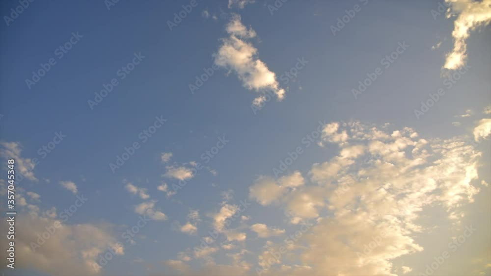Beautiful moving blue sky with clouds background.. 4k Time-lapse and slow-motion video footage of moving cloud . Beautiful moving blue sky with clouds background.. 4k Time-lapse and slow-motion video footage of moving cloud .