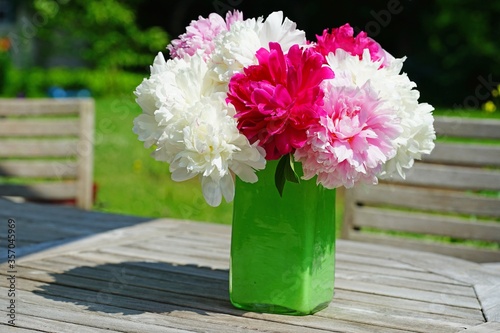 Fototapeta Naklejka Na Ścianę i Meble -  Bouquet of fragrant white and pink herbaceous peony flowers