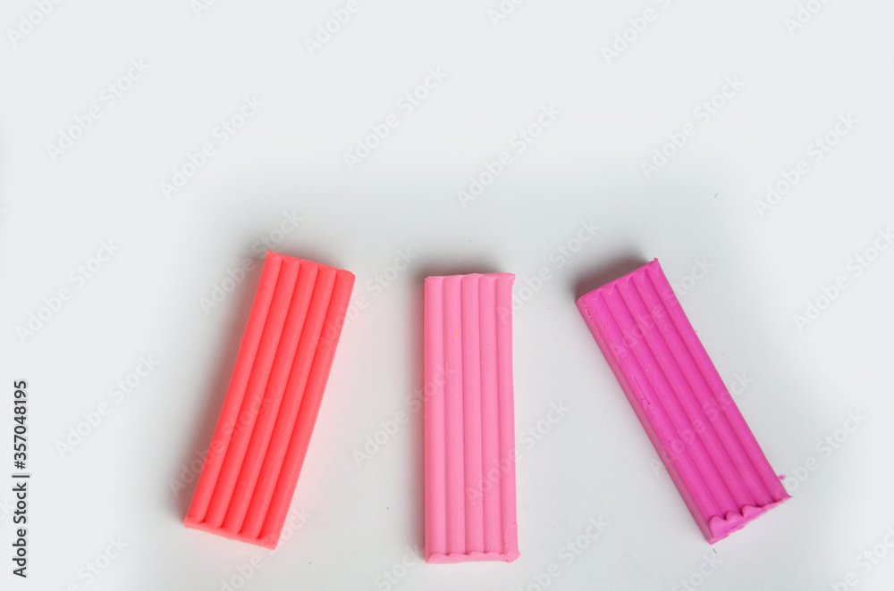 A set of colors of Modeling clay. Modeling and design for children. on white background A set of colors of Modeling clay. Modeling and design for children. on white background
