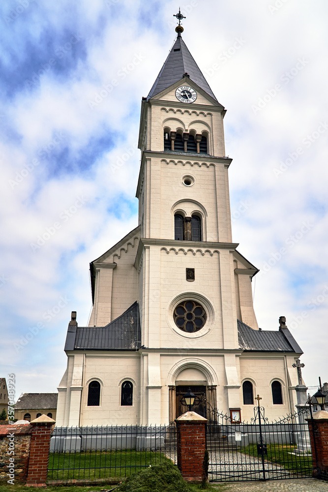 A historic parochial church with a belfry  Poland .