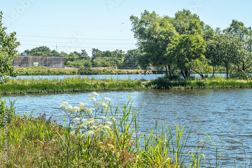 Looking over a lake to offices of small businesses