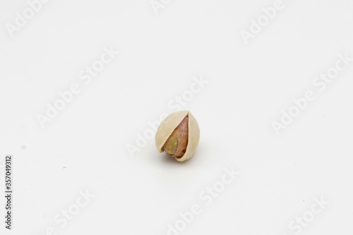 Smiley pistachio Dry fruit on white background, pistachio benefits  photo