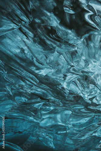 Ice texture. Blue ice of the Vatnajokull glacier in Iceland. photo