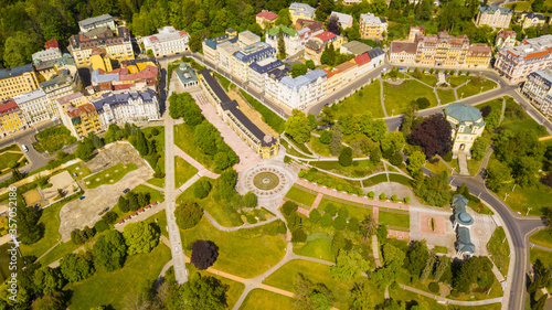 Aerial view of Marianske Lazne spa (Marienbad). Fountain in spa colonnade from above. Karlovy Vary Region of the Czech Republic, European union. Famous spa town with curative carbon dioxide springs. photo