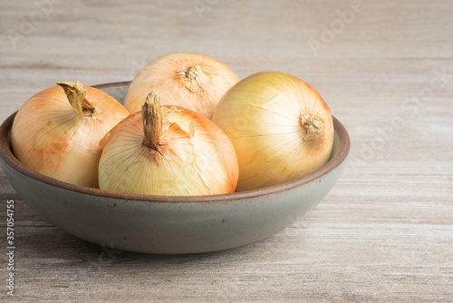 Whole Sweet Onions In A Bowl