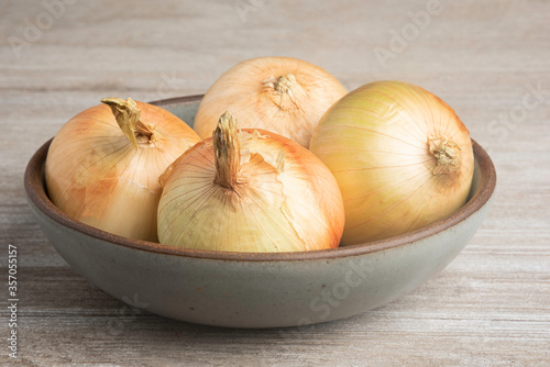 Whole Sweet Onions In A Bowl
