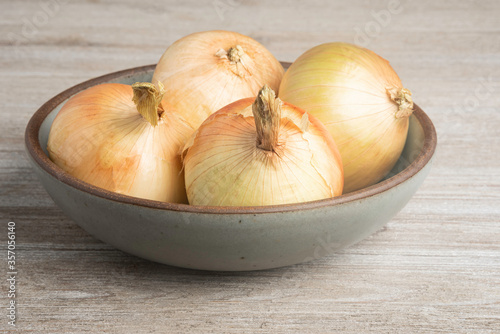 Whole Sweet Onions In A Bowl
