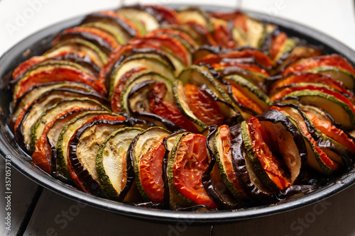 Valokuva French baked ratatouille on white background