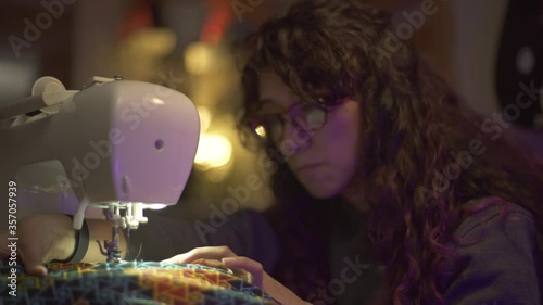 Woman spents hours working a sewing machine