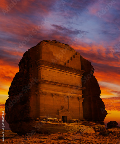 Tomb of Lihyan (Qasr AlFarid) during sunset at Mada'in Saleh archaeological site near Al Ula, Saudi Arabia photo