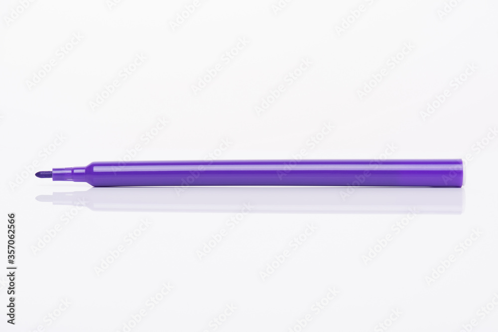 Side profile view close-up photo of light vioet purple marker with cap off isolated on white background Side profile view close-up photo of light vioet purple marker with cap off isolated on white background