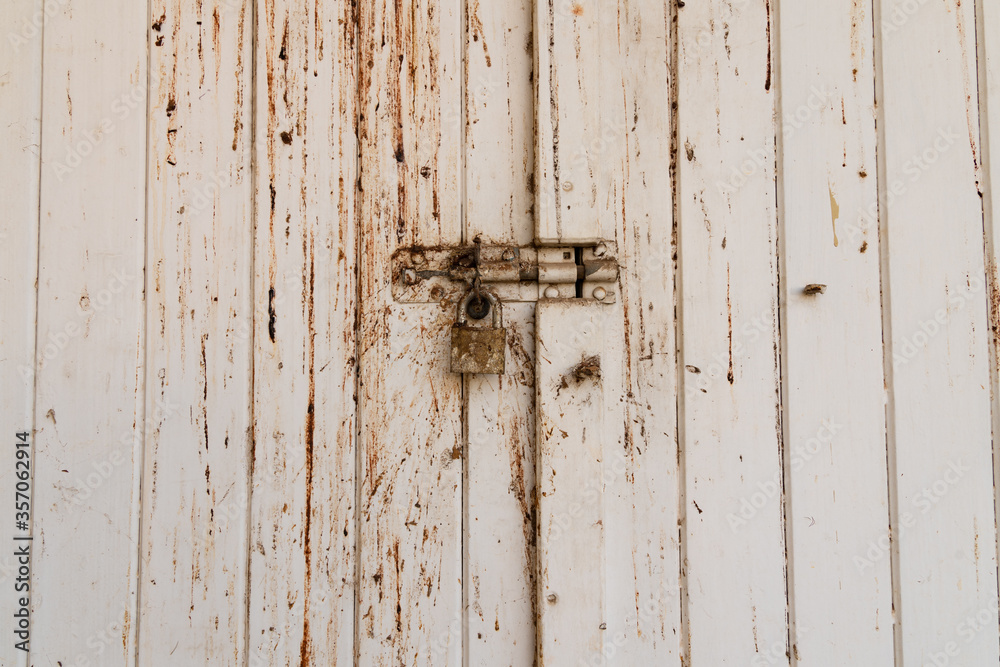 Rustic Black and white background of wooden plank and lock Rustic Black and white background of wooden plank and lock