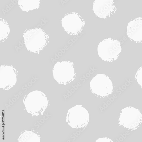 Vector seamless polka dots pattern with brush strokes. Cute design for fabric, wrapping, stationery, wallpaper, textile