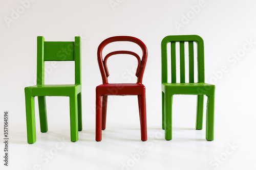 Chairs In Green And Red  Stand Out Concept