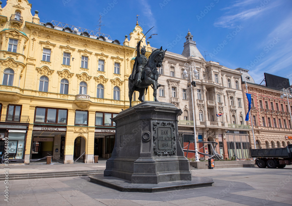 Zagreb, Croatia-April 15th, 2020: Statue of famous croatian general, towering on the horse above Zagreb`s main square, empty during corona virus epidemic and after earthquake damaged the city