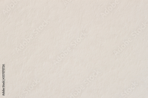 Texture of cream paper, background for design with copy space