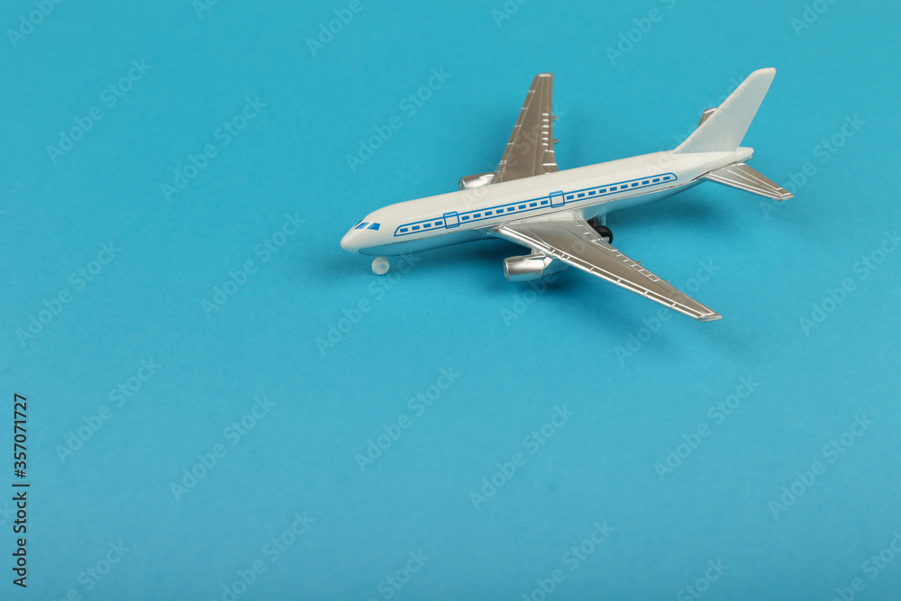 toy air plane on blue background top view with copy space toy air plane on blue background top view with copy space