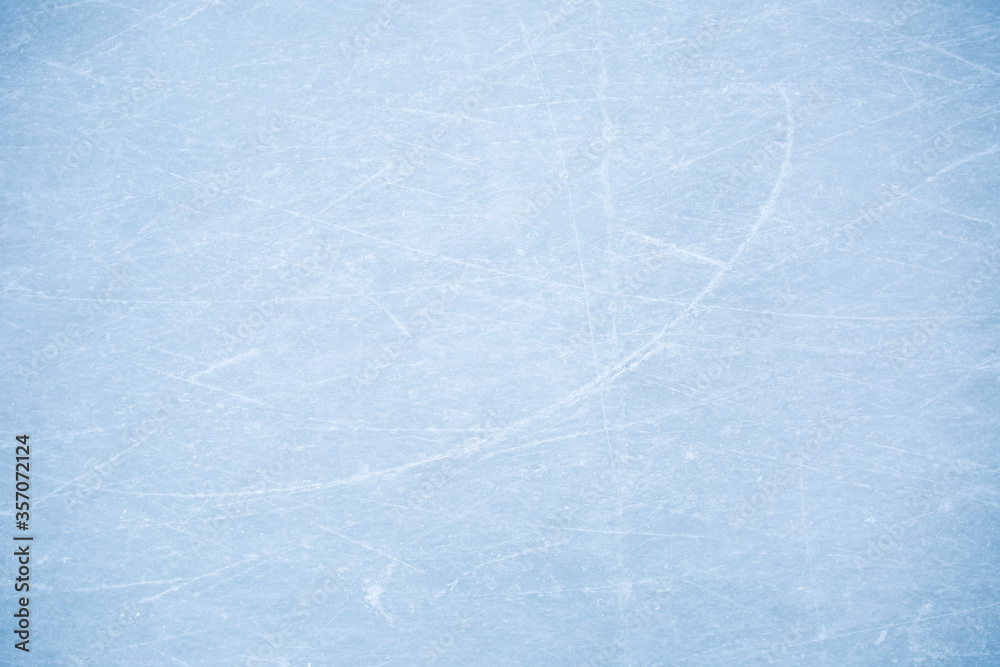 Obraz premium blue texture of ice skates tracks on the rink