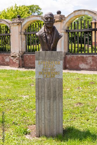 Canvas Print Kulpin, Serbia - June 02, 2020: Memorial bust of Lazar Dundjerski in Kulpin
