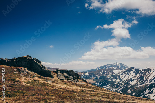 A large mountain in the background