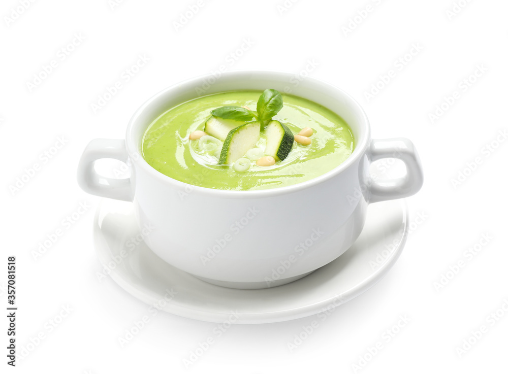 Tasty homemade zucchini cream soup isolated on white Tasty homemade zucchini cream soup isolated on white
