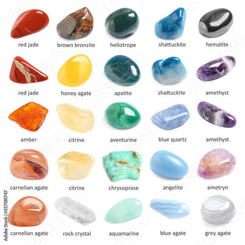 Collection of different gemstones on white background