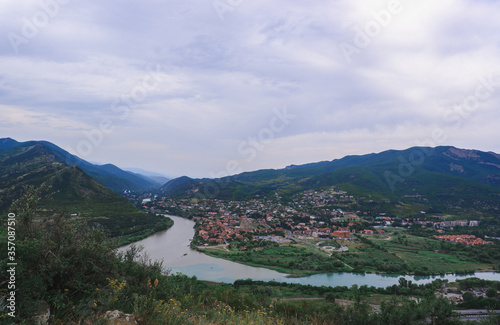 Confluence of two rivers Kura and Aragvi. Mtskheta, an ancient city of Georgia. Travel to the sights of the Caucasus.