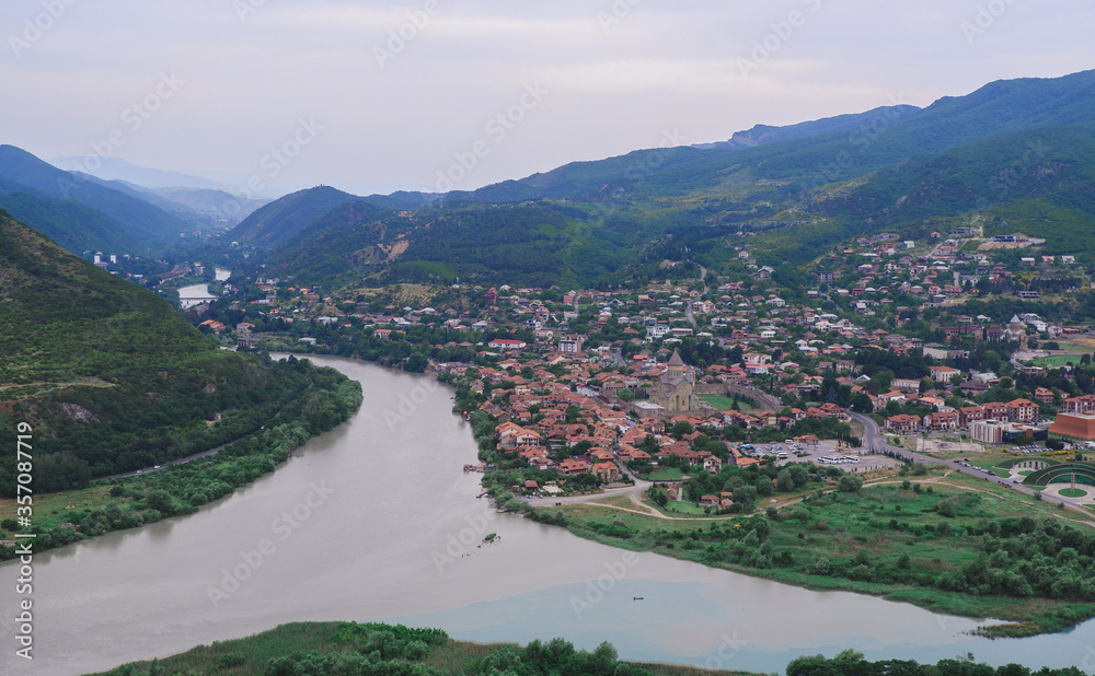 Confluence of two rivers Kura and Aragvi. Mtskheta, an ancient city of Georgia. Travel to the sights of the Caucasus.