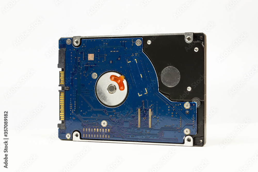 Old hard drive isolated on white background.