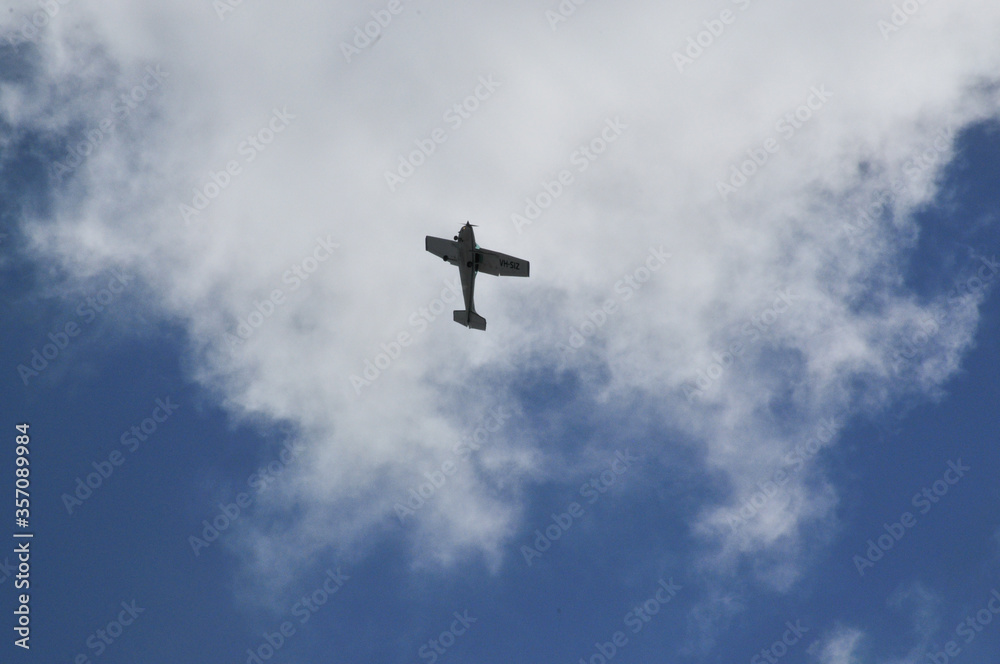 propeller plane flying around the neighbourhood practicing in the morning. propeller plane flying around the neighbourhood practicing in the morning.
