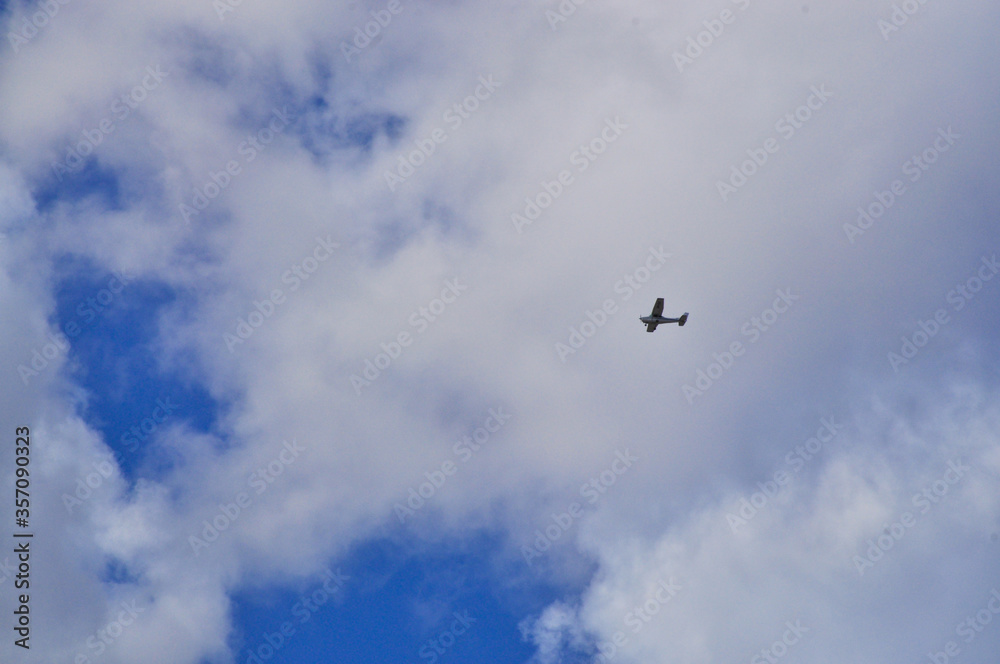 propeller plane flying around the neighbourhood practicing in the morning. propeller plane flying around the neighbourhood practicing in the morning.