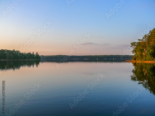 Reflection of a blue-and-pink sky on a lake