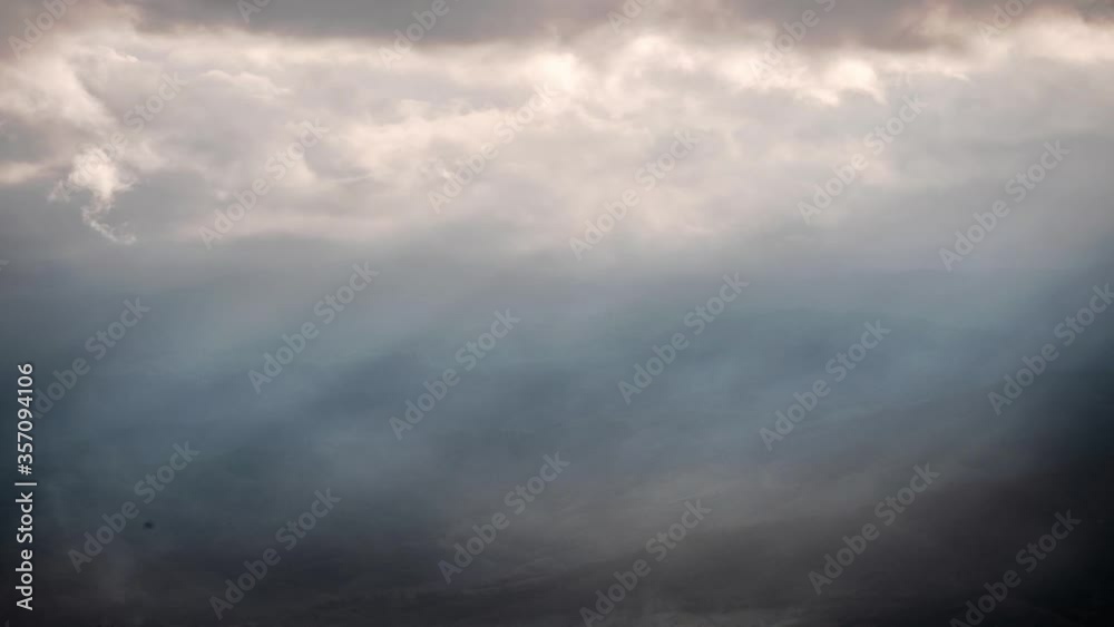 The forest on a complex mountain range that requires sunlight through a beam of light passing through the clouds at Doi Inthanon, Chiang Mai, Thailand. The forest on a complex mountain range that requires sunlight through a beam of light passing through the clouds at Doi Inthanon, Chiang Mai, Thailand.